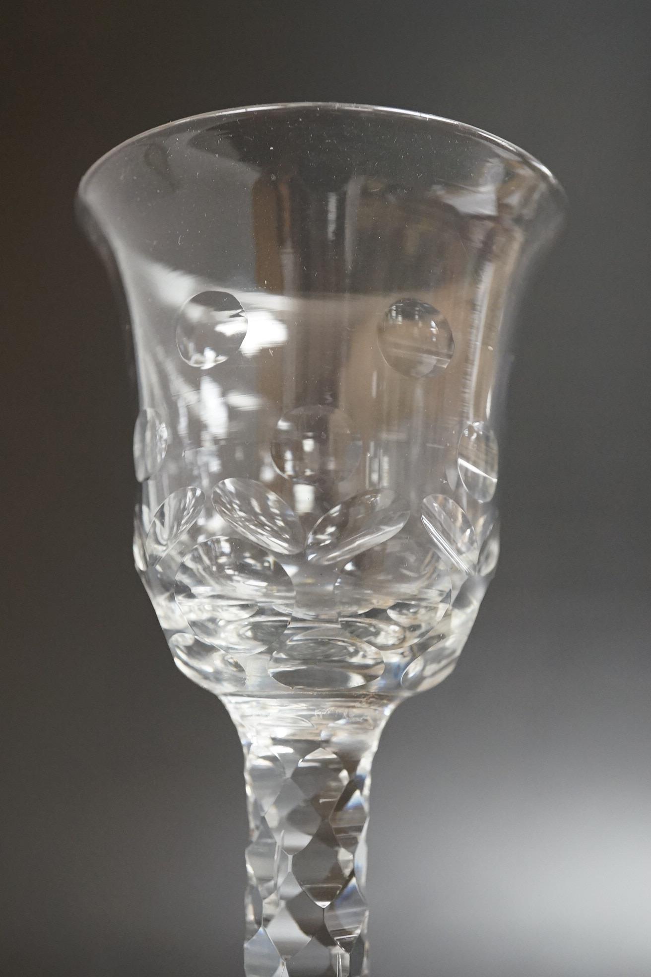Two faceted wine glasses, c.1775, one with faceted star cut foot, tallest 15cm